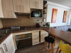 Kuchyň nebo kuchyňský kout v ubytování CENTRAL VISTA LOS INGLESES 2 VALPO