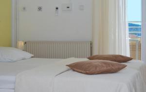Posteľ alebo postele v izbe v ubytovaní Villa Klaudia