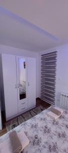 Voodi või voodid majutusasutuse Apartman Vesna toas