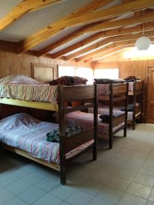 Postel nebo postele na pokoji v ubytování Habitaciones y Apartamentos el Caleuche El Tabo