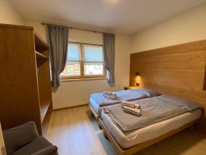 Posteľ alebo postele v izbe v ubytovaní Alaska Charm House
