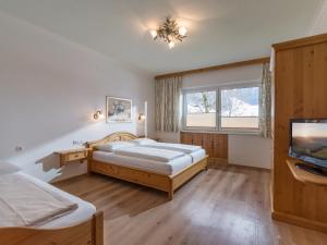 Postel nebo postele na pokoji v ubytování Appartementhaus Fuchs
