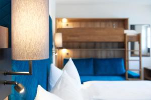 Postel nebo postele na pokoji v ubytování Lerchs Landhotel