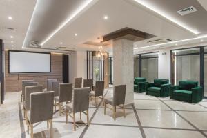 Et opholdsområde på Green Luxury Apartments + 12 billeder