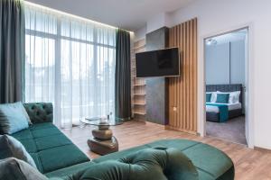 Кът за сядане в Green Luxury Apartments