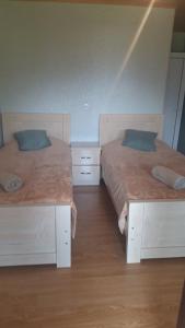 Letto o letti in una camera di Jeiran Japaridze's Guesthouse