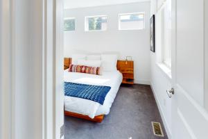 Postel nebo postele na pokoji v ubytování Mountain Sky Cottage