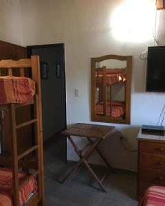 En eller flere senge i et værelse på Paz y Armonia Habitaciones