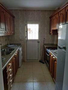 A kitchen or kitchenette at 2bed rooms 95m, Garden&sea view, first floor, Family only دور اول بمدخل مستقل