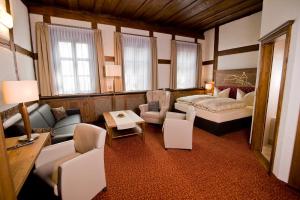 Katil atau katil-katil dalam bilik di Burg Colmberg Hotel
