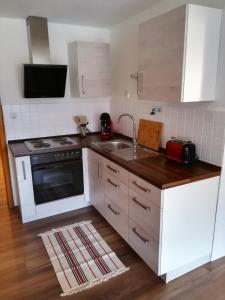 Kuchyň nebo kuchyňský kout v ubytování Ferienwohnung Gärtner