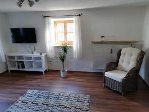 TV a/nebo společenská místnost v ubytování Ferienwohnung Gärtner