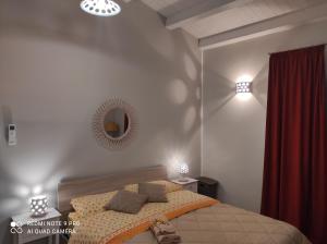 A bed or beds in a room at Case Vacanza Le Casette