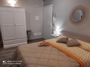 A bed or beds in a room at Case Vacanza Le Casette