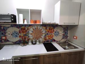 A kitchen or kitchenette at Case Vacanza Le Casette