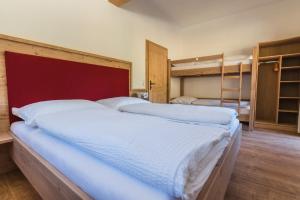 Posteľ alebo postele v izbe v ubytovaní d'Genussalm by Alpine Genusswelten
