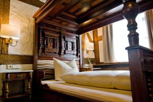 Katil atau katil-katil dalam bilik di Burg Colmberg Hotel