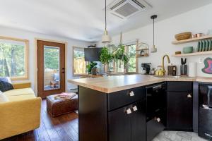 a kitchen with a large island in a room at The Herwood Inn in Woodstock