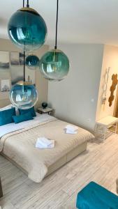 Ένα ή περισσότερα κρεβάτια σε δωμάτιο στο MAGRI Luxurious Apartment A42 Borovets Gardens