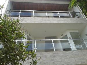 - Vistas a una casa con balcón en Casa de Vidro, en Itacaré