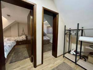Postel nebo postele na pokoji v ubytování Casa Nostra Kop