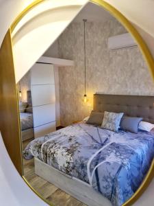 Un pat sau paturi într-o cameră la Atlantic Paradise