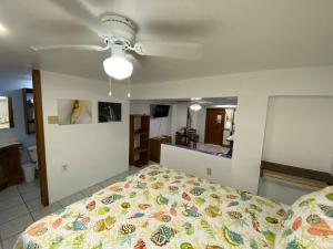 Voodi või voodid majutusasutuse Mariposa Lodge toas