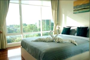 Cama o camas de una habitación en Baan Sanploen Huahin Condo By KK