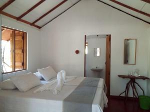 Postel nebo postele na pokoji v ubytování Rivosen Camp Yala Safari