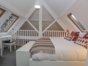 Un ou plusieurs lits dans un hébergement de l'établissement Moorhurst Cottage