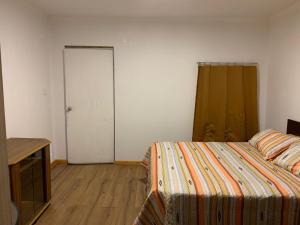 Katil atau katil-katil dalam bilik di Viña City Hostel II