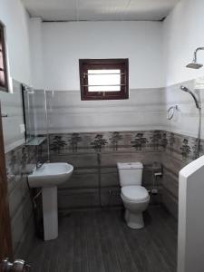 Ένα μπάνιο στο Villa Dineth