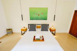 Postel nebo postele na pokoji v ubytování Villa Orked 3 with family room Seminyak