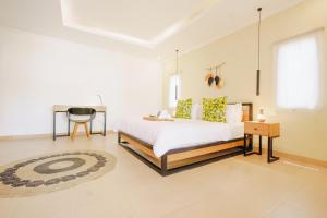Postel nebo postele na pokoji v ubytování Villa Orked 3 with family room Seminyak