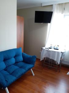 Televízia a/alebo spoločenská miestnosť v ubytovaní Ceylan Apart Otel