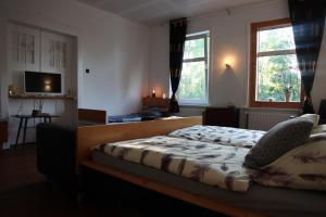 A bed or beds in a room at Ahoi