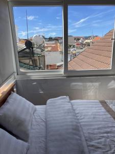 Postel nebo postele na pokoji v ubytování Holly Hostel