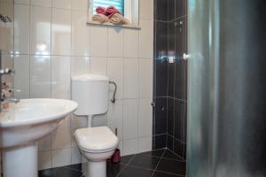 Kúpeľňa v ubytovaní Apartments Sutalo 2