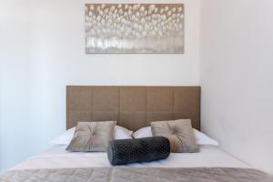 Posteľ alebo postele v izbe v ubytovaní Apartments Sutalo 2