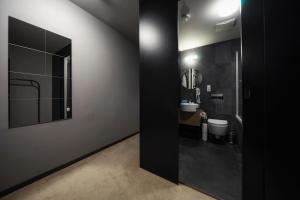 Koupelna v ubytování Hotel NOIR