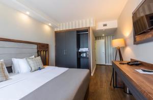 Postel nebo postele na pokoji v ubytování Misal Hotel Trabzon