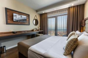 Postel nebo postele na pokoji v ubytování Misal Hotel Trabzon + 37 fotografií