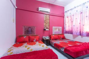 Krevet ili kreveti u jedinici u objektu SPOT ON 90156 Bidara Guest House
