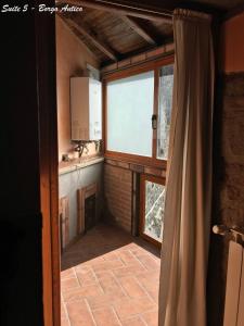 Kuchyň nebo kuchyňský kout v ubytování Albergo Diffuso Locanda Specchio Di Diana