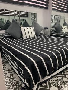 Posteľ alebo postele v izbe v ubytovaní Yumboparadise