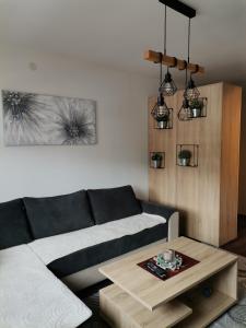 Een zitgedeelte bij Sunčani Breg apartman 10