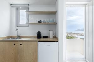 Kuchyň nebo kuchyňský kout v ubytování Teal Blue + 31 fotografií