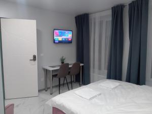 Una cama o camas en una habitación de Pure Apartments VIP 2