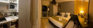 une chambre d'hôtel avec un lit et une salle de bain dans l'établissement Studio Nikita Manganao, Appartement Standing Vue mer, à Saint-François 66 autres photos