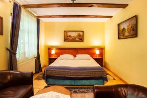 Posteľ alebo postele v izbe v ubytovaní Hotel Dworek Wapionka